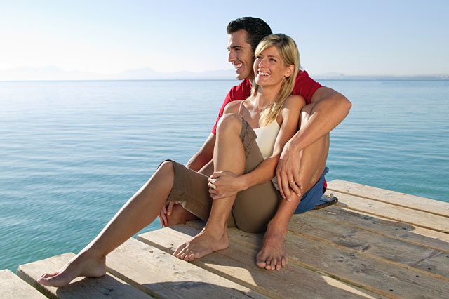 couple sitting on dock